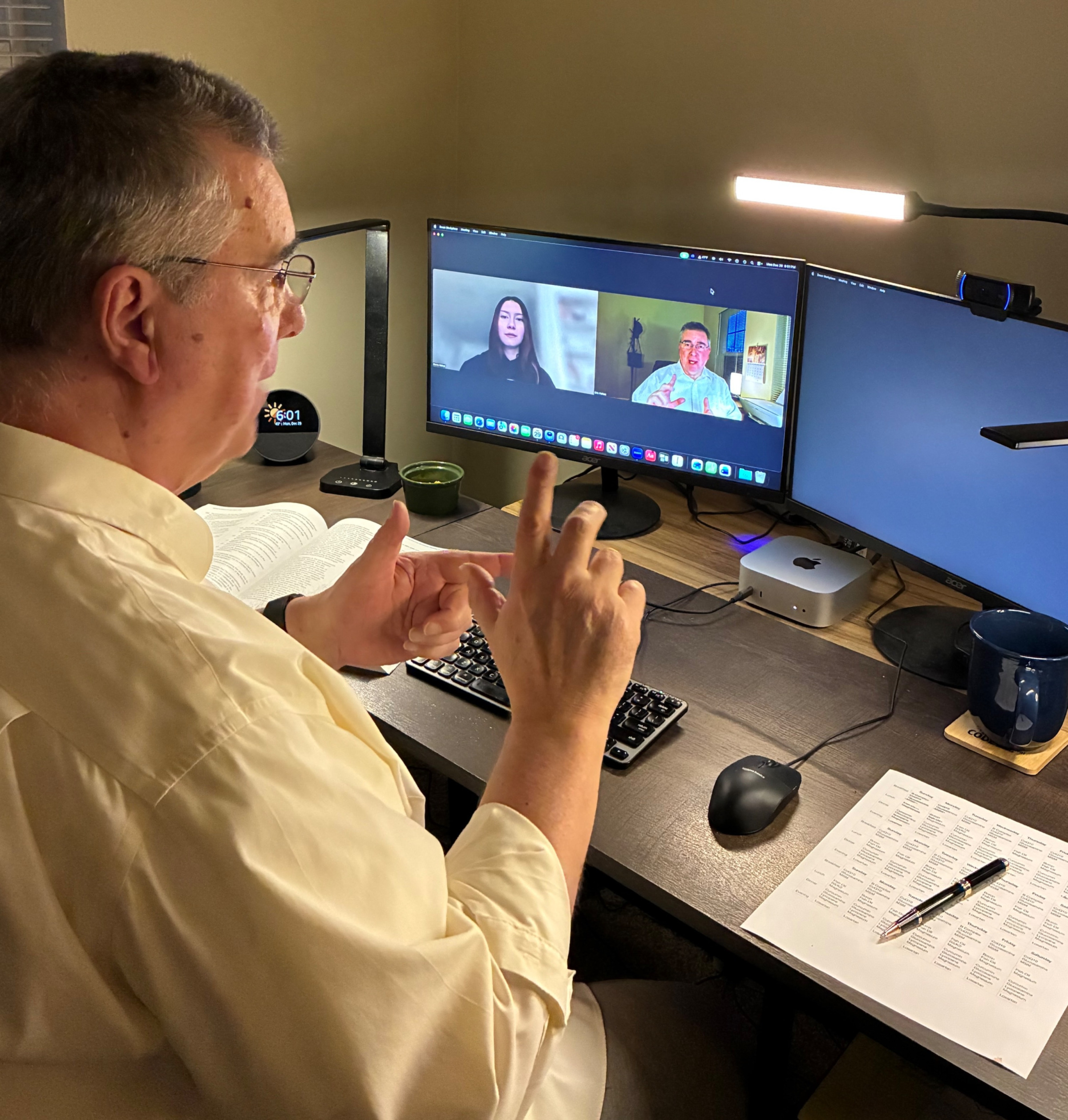 Eric Hallett teaching a student via computer